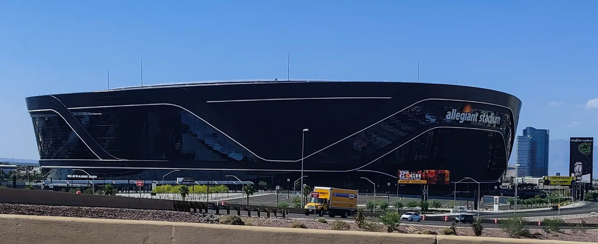 Wide exterior view of the silver and black Allegiant Stadium in Paradise, Nevada, May 2021