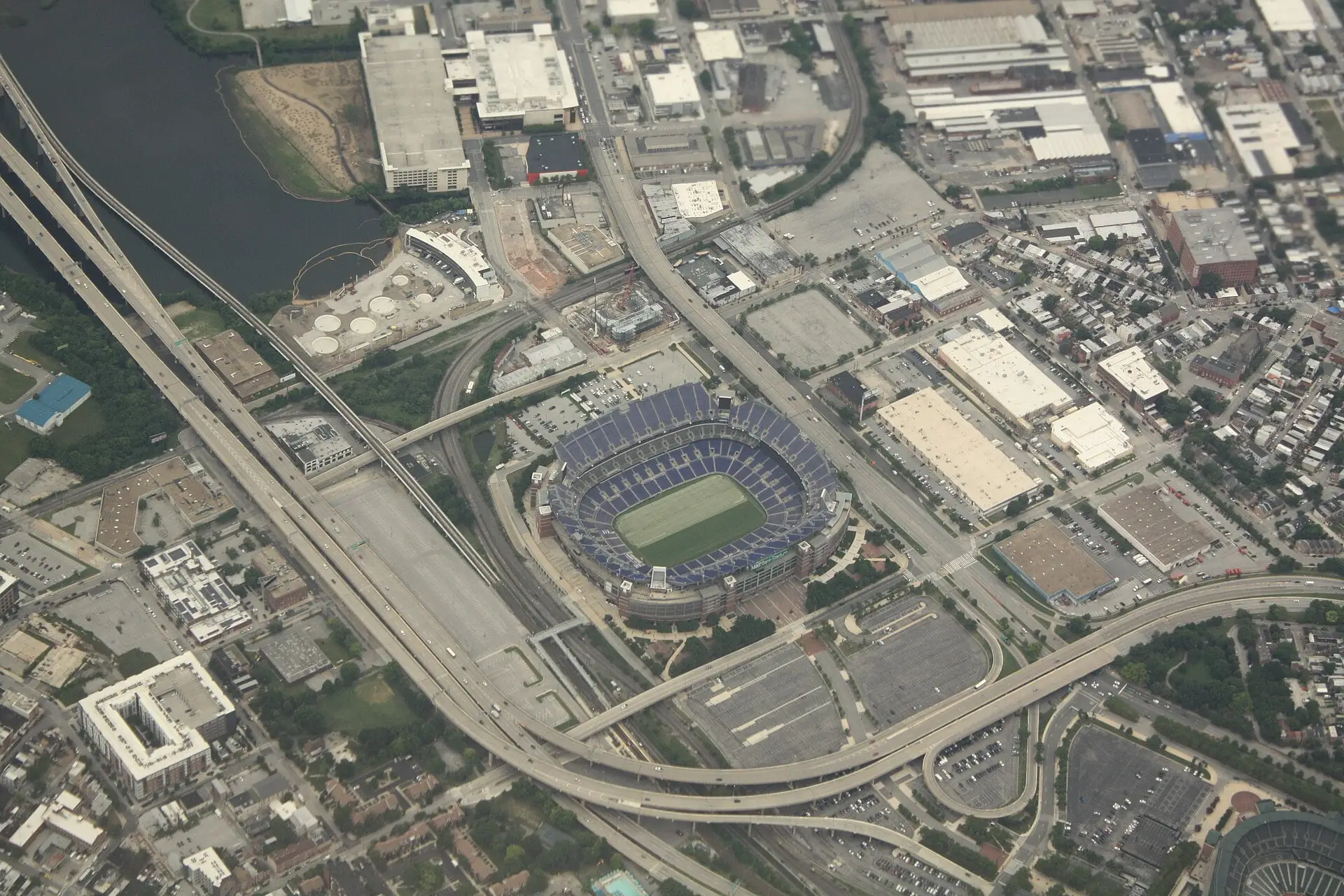Aerial view of M&T Bank Stadium looking southwest, with Ridgleys Cove at upper left and part of Camden Yards at lower right