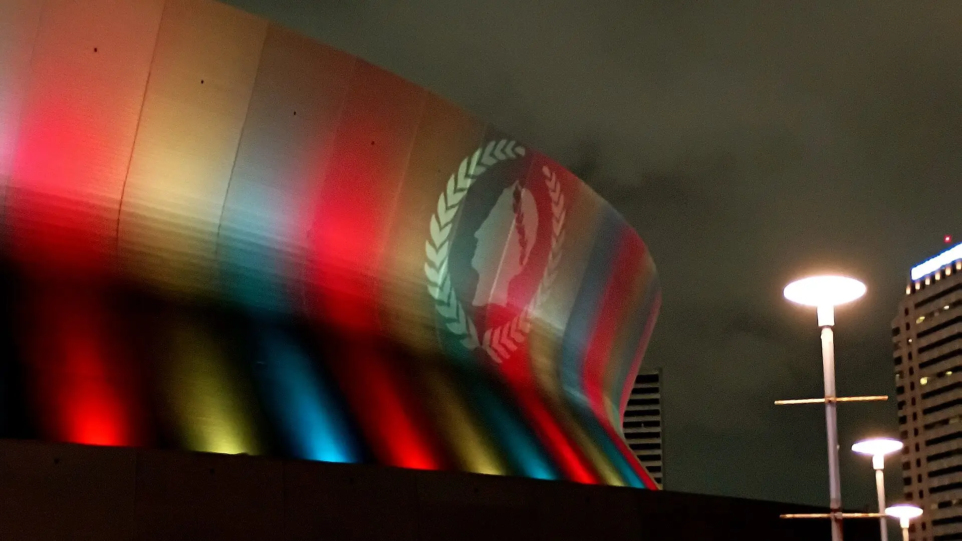 The Caesars Superdome lit up at night on Sugar Bowl Drive, April 2025